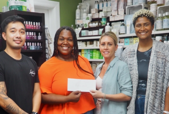 Island Naturals Marks 10th Anniversary With $15,000 Donation To Meals On Wheels